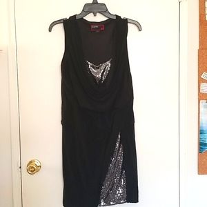 Sleeveless black party dress with silver sequins.